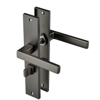 Gun-metal Fano WC-slot deurklink op lang schild 245 × 45 mm hartafstand 63 mm voor industriële badkamerdeuren