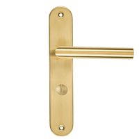 Geveerde Andria WC-deurklink mat goud met PC 63 mm hartafstand en soepele terugveeractie 
