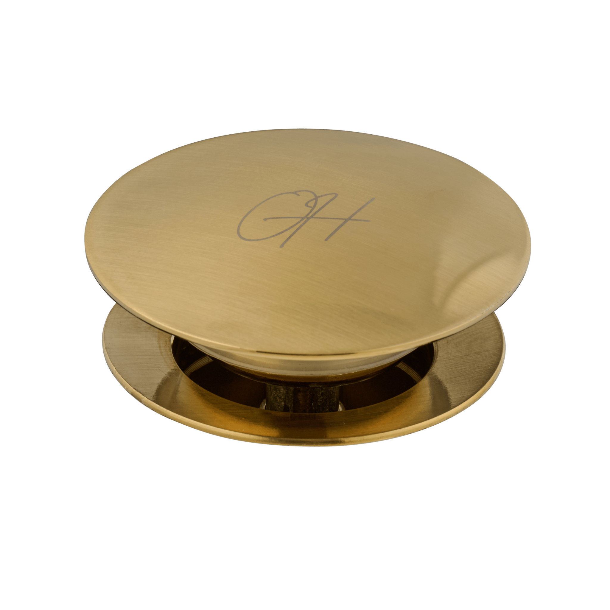 Gouden Flusso afvoerplug van Ostiumhome® – alleen het bovenaanzicht van de zichtbare dop in luxueuze afwerking

