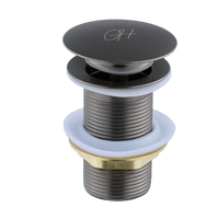 Gun Metal wastafelplug uit de Flusso lijn van Ostiumhome® – pop-up click waste volledig zichtbaar

